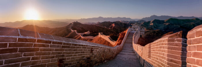 Jinshanling great wall of china snaking into the distance at sunset
