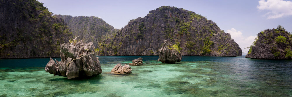 Panorama of a turquoise hidden lagoon on Coron island in Palwan, Philippines