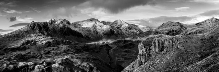 Panorama of the Eskdale needle and scafell pike in the lake district in black and white