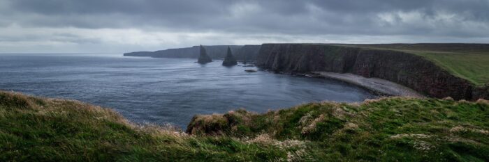 A panoramic print of dramatic stormy Scottish coast