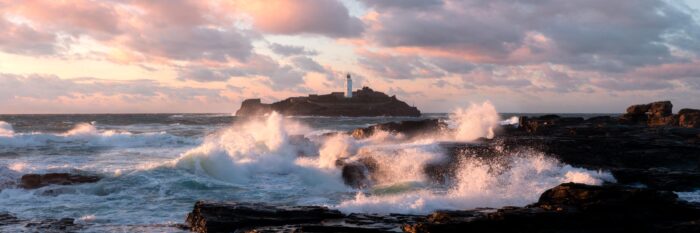 Panorama of the Godrevy Lighthouse at sunset in Cornwall