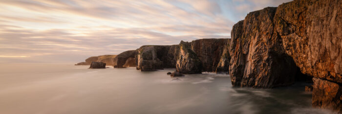 Panorama of the Pembrokeshire Cliffs at sunset at stack rocks and castlemartin