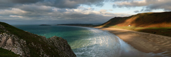 Panorama of Rhossili Beach on the Gower Peninsula in Wales