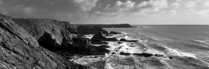 black and white panorama of the rocky Pembrokeshire coast