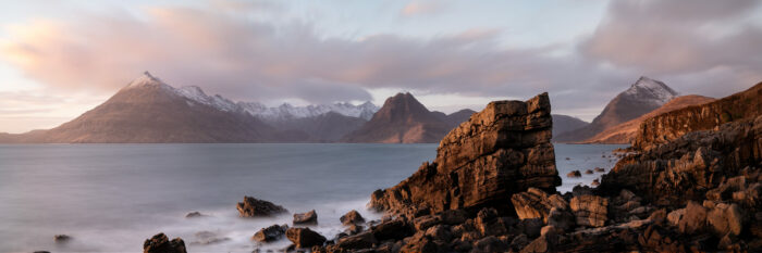 Panorama of the Elgol Coast and Cuillin mountains at sunset on the Isle of Skye