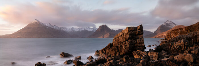 Panorama of the Elgol Coast and Cuillin mountains at sunset on the Isle of Skye