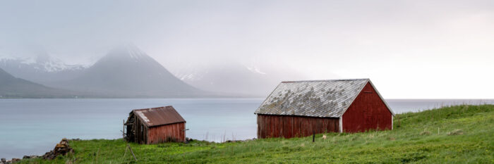 Panorama of ageing Norwegian red huts and cabins