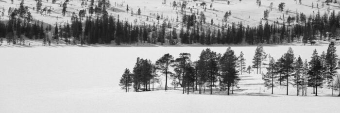 Panorama of a frozen lake Majavatnet in winter in Norway