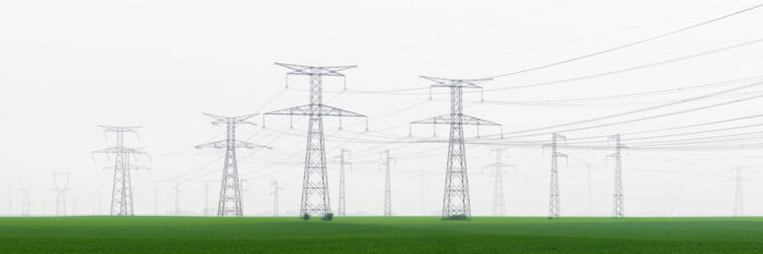 Panorama of Electricity Pylons in a field in France