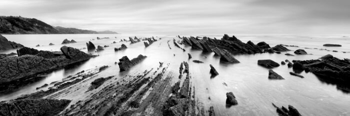 B&W Panorama of the Playa De Sakoneta Flysch formations in Spain