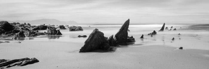 B&W Panorama of Barrika beach in Spain