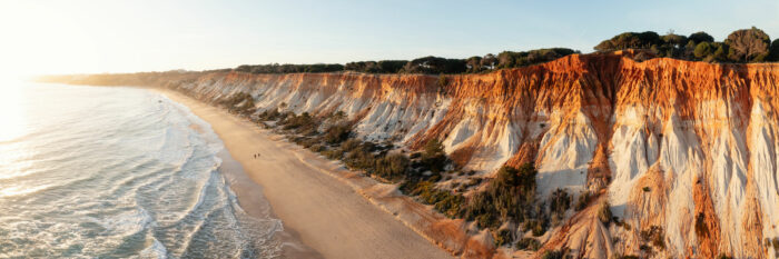 Aerial Panorama of Falésia Beach at sunset in the Algarve Portugal