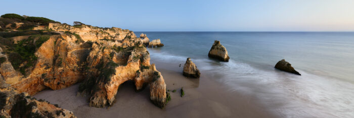 Panorama of the Praia da Prainha cliffs in the flow of twilight in the Algarve