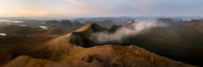 Aerial Panorama of Beinn Alligin mountain at sunset in Torridon