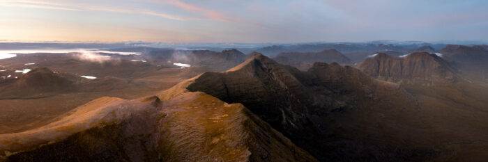 Aerial Panorama of Beinn Alligin mountain at sunset in Torridon