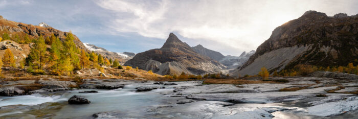 Panorama of a glacial river flowing from Ferpecle Glacier in Val d'Hérens Pennine Alps Switzerland