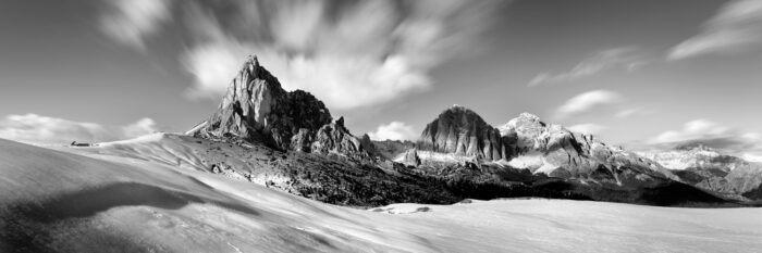 B&W Panorama of Passo Giau covered in snow in the Dolomites, Italy