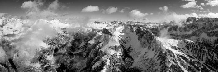 B&W panorama of Val Gardena from above in the Italian Dolomites