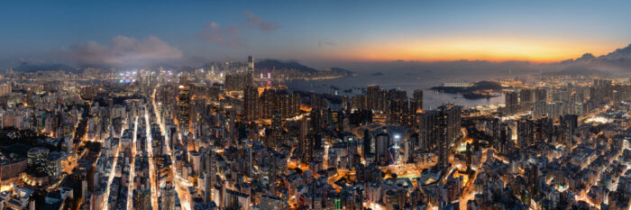 Hong Kong Kowloon panoramic cityscape at sunset.