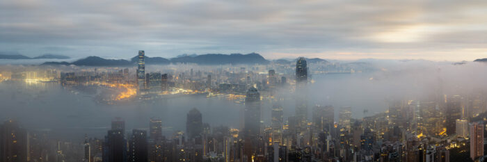Panoramic print of mist over the Hog Kong Skyline at sunrise from the Peak