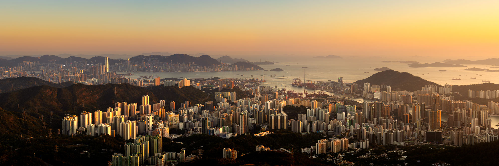 Panorama of the Hong Kong Skyline from Tai Mo Shan Mountain at sunset