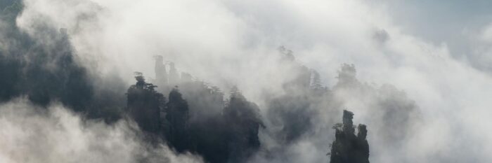 Panorama of the Tianzi mountain pillars shrouded in mist in China