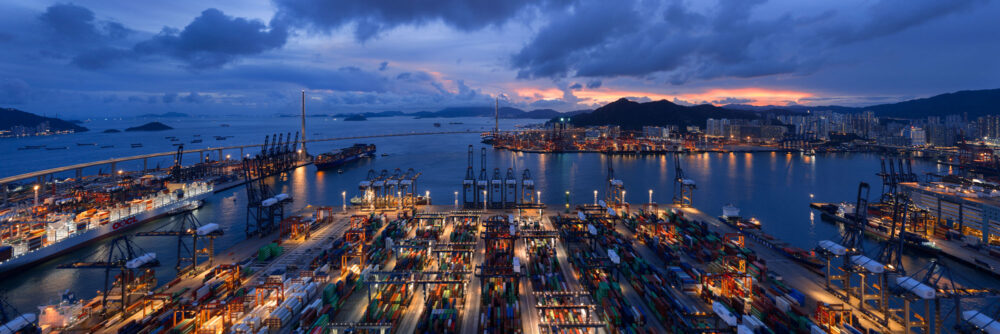 Aerial panoramic view of the Kwai Ching and Kwai Tsing container terminals in Hong Kong at sunset