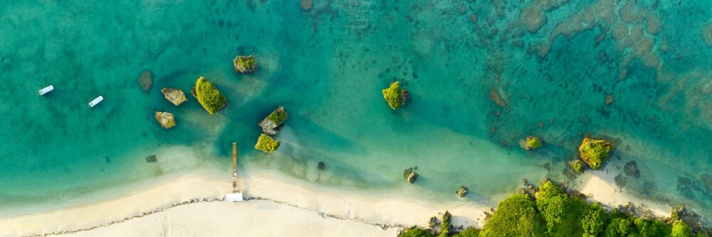 Aerial panoramic art print above Mibaru Beach in Okinawa Japan