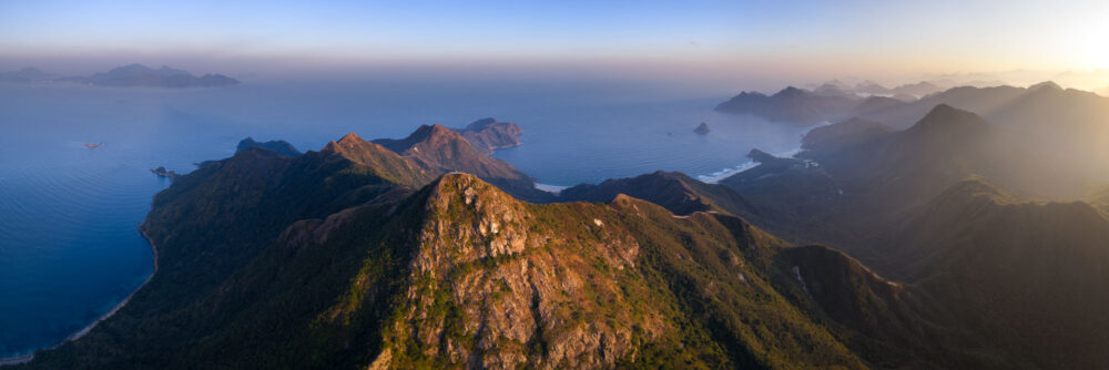 Aerial Print or Sharp Peak and Tai Long Wan Bay during golden hour in San Kung, Hong Kong.