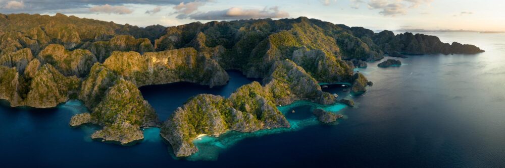 Aerial Panorama of the Lagoons and Lakes on Coron Island at sunset in Palawan, Philippines