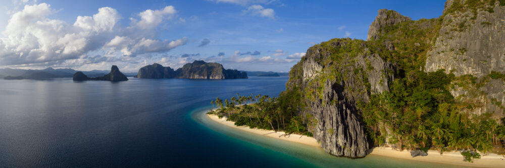 Aerial panorama of Ipil Beach on Pinagbuyutan Island in Bacuit Bay, El Nido, Palawan, Philippines
