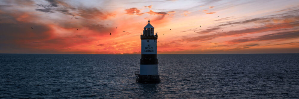 Panoramic Print of the Penmon Point Lighthouse in Anglesey in Wales at sunset
